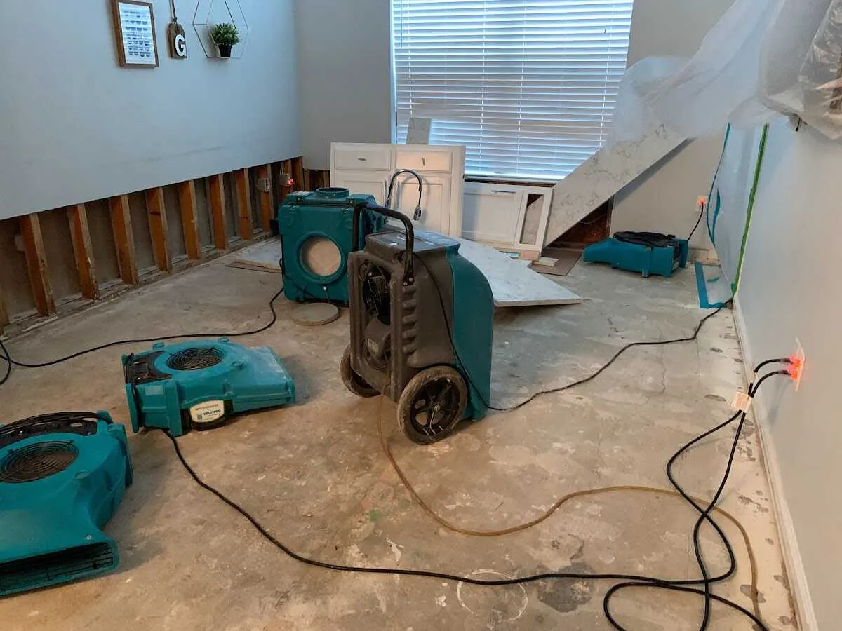 Dehumidifier in flood-cut room for Water Damage Restoration in Eastham